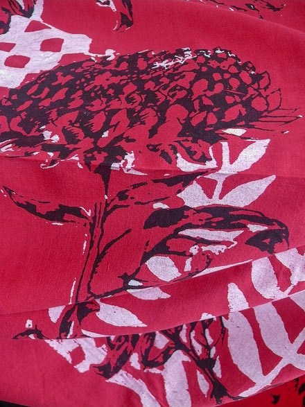 White and Black Waratah Print on Red Shot Cotton